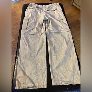 Men’s long khaki colored zip off cargo pants size 33